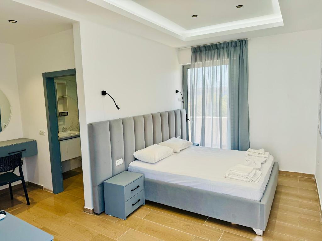 Postel nebo postele na pokoji v ubytování Petros rooms
