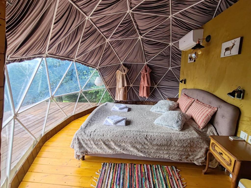 Postel nebo postele na pokoji v ubytování Glamping ZAZEN