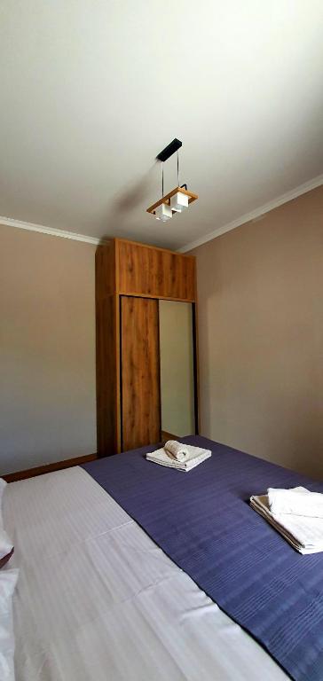 Llit o llits en una habitació de Guest house "Soulmate"