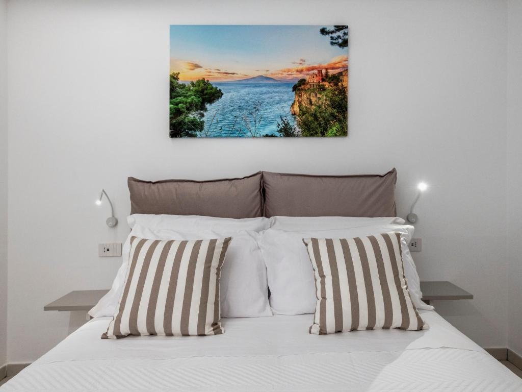 Postel nebo postele na pokoji v ubytování B&B GargiuloFamily