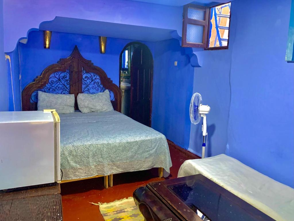 Postel nebo postele na pokoji v ubytování Hôtel Barcelona