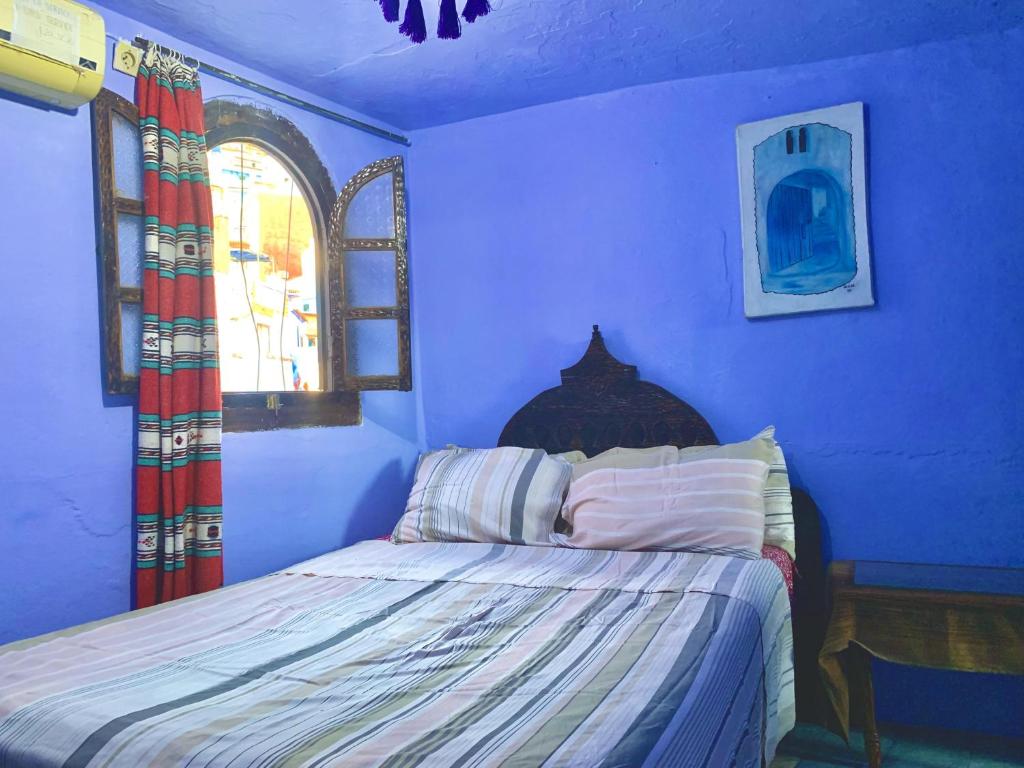 Postel nebo postele na pokoji v ubytování Hôtel Barcelona
