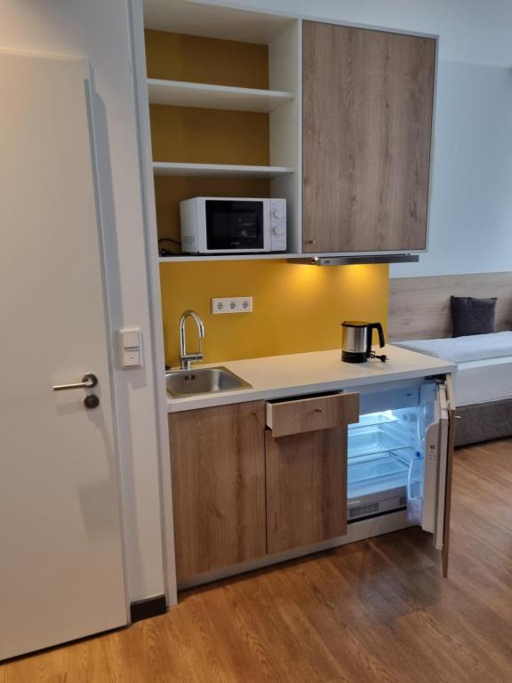 my MINGA Airport serviced Apartments - Deluxe Doppel- Oder Zweibettzimmer