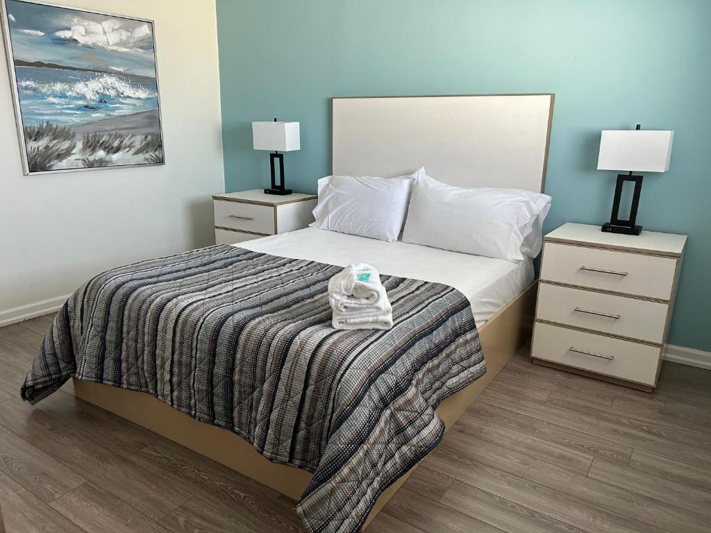 Postel nebo postele na pokoji v ubytování Esplanade Suites - A Sundance Vacations Property