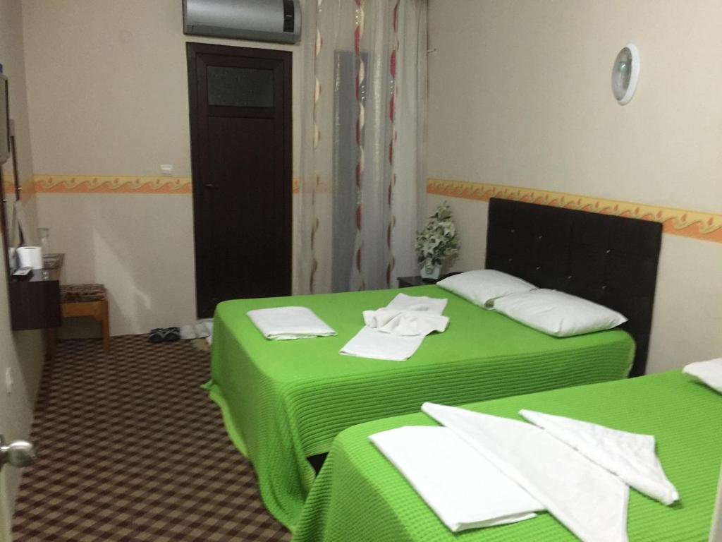 Postel nebo postele na pokoji v ubytování Anatolia Hotel