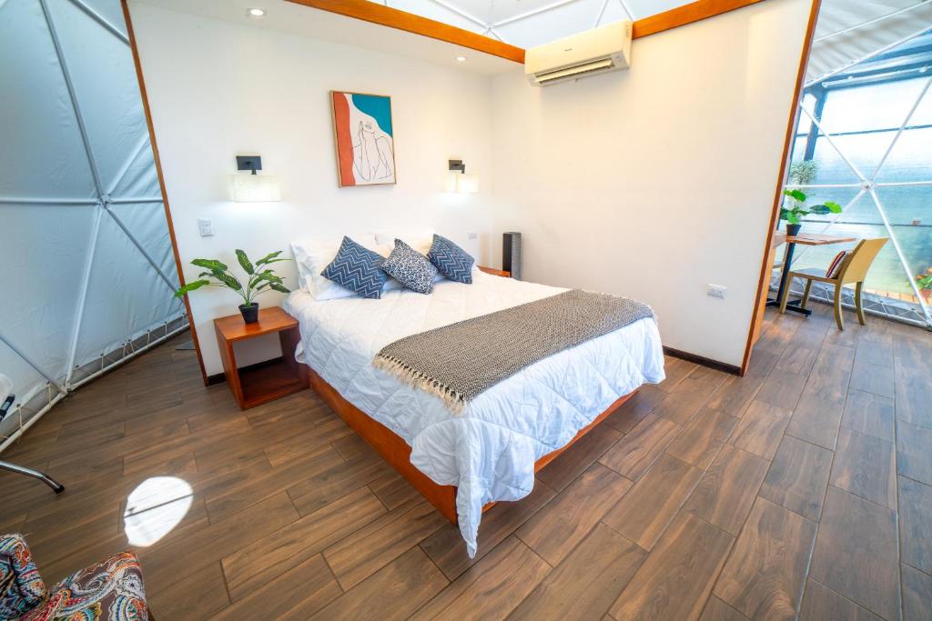 Postel nebo postele na pokoji v ubytování Tocuma Glamping