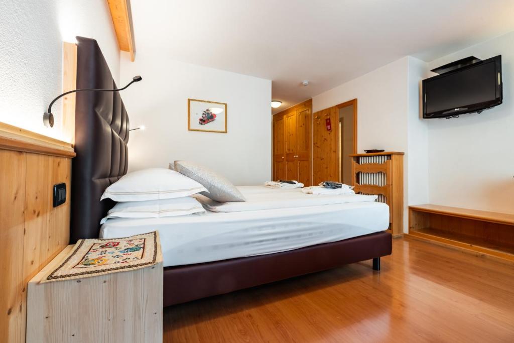 Postel nebo postele na pokoji v ubytování Hotel St. Michael