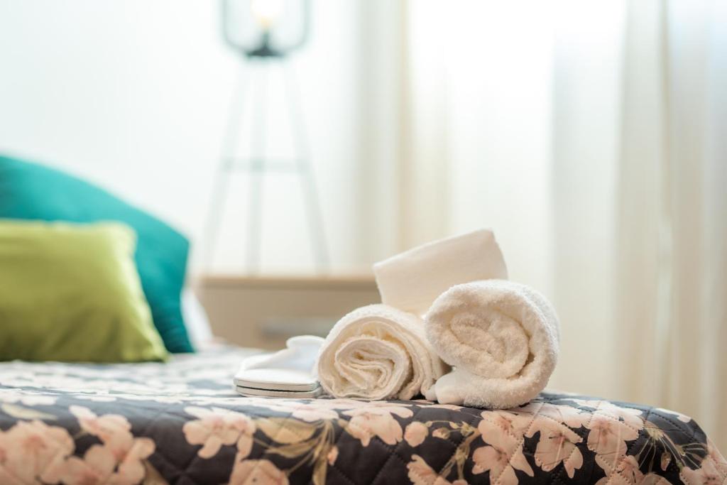 Ένα ή περισσότερα κρεβάτια σε δωμάτιο στο Naïsa apartamento turístico