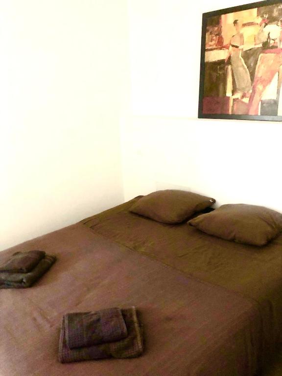 Postel nebo postele na pokoji v ubytování L'atelier