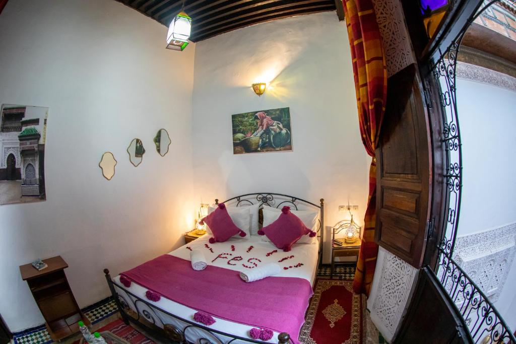 Postel nebo postele na pokoji v ubytování Riad LalaMoune