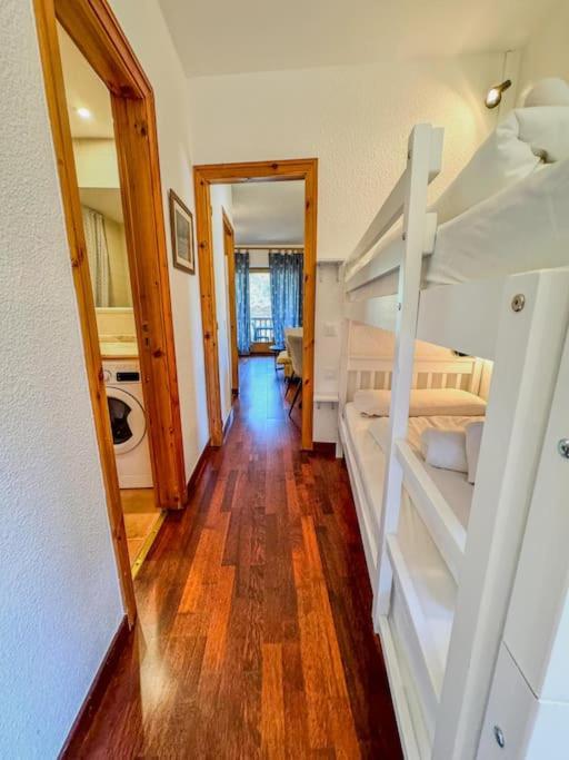 Postel nebo postele na pokoji v ubytování Acogedor estudio en el Tarter 4pax Parking-ES
