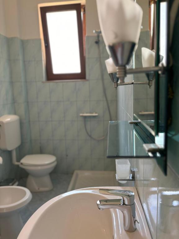 Koupelna v ubytování Hotel Vlora 78