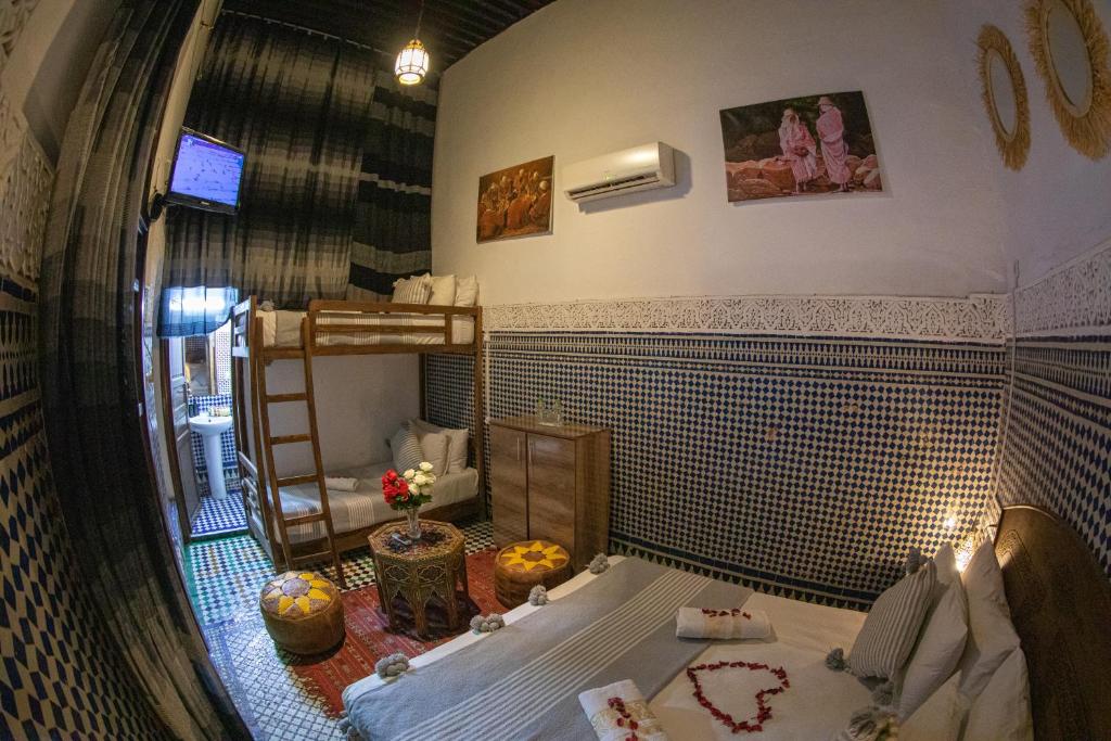 Postel nebo postele na pokoji v ubytování Riad LalaMoune