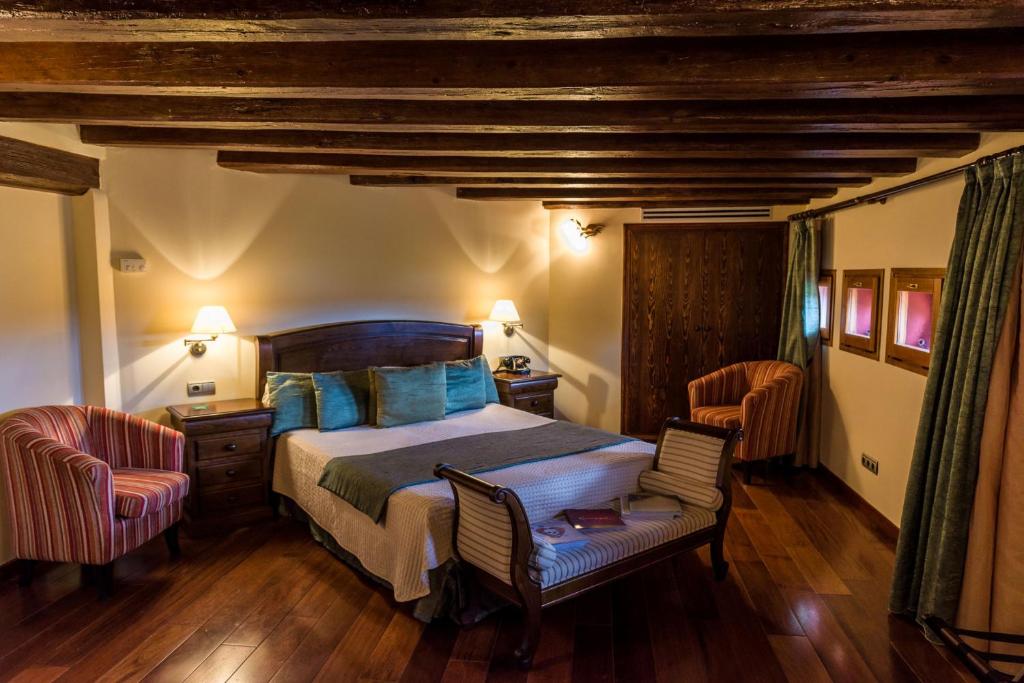 Posteľ alebo postele v izbe v ubytovaní Hotel Villa Retiro