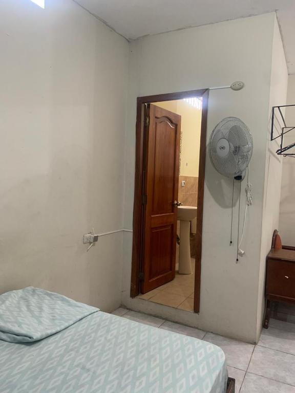 Postel nebo postele na pokoji v ubytování Habitaciones amobladas - Manabí suites