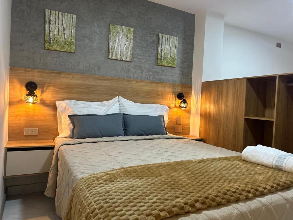 Postel nebo postele na pokoji v ubytování Provenza Medellin Hotel Boutique