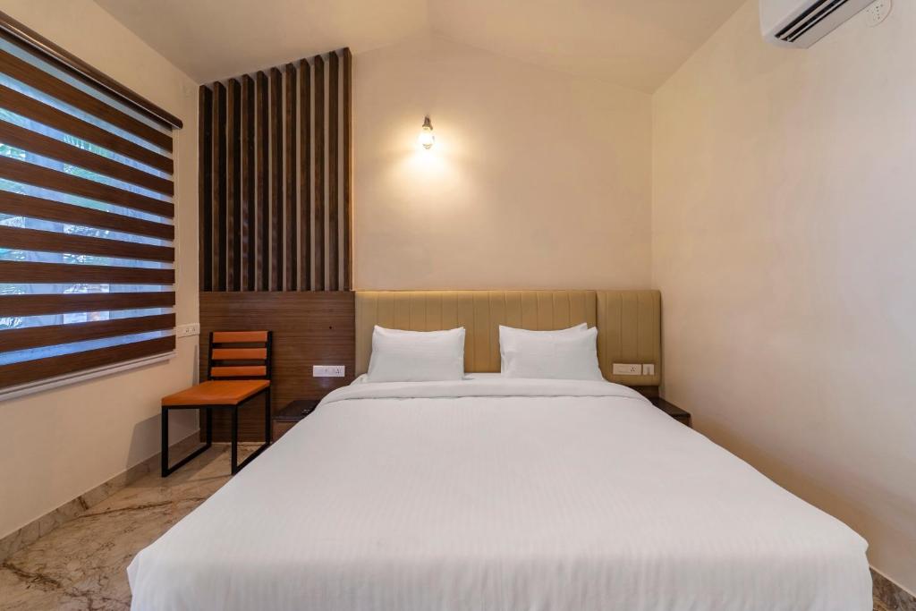 Postel nebo postele na pokoji v ubytování Palette - Coastal Grand Hotels & Resorts, OMR