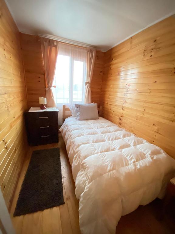 Letto o letti in una camera di Cabanas Palafitos Dalmacia