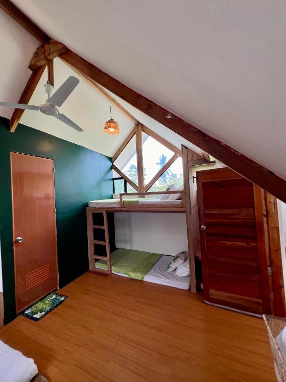Postel nebo postele na pokoji v ubytování Hakuna Villas
