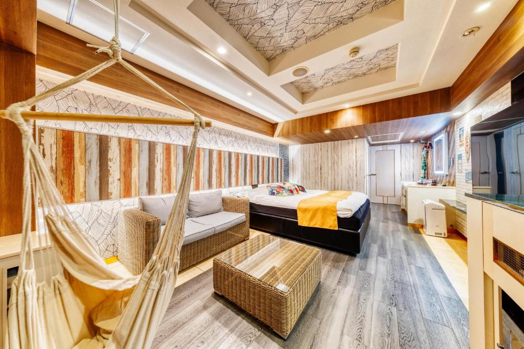 Posezení v ubytování HOTEL ATLANTIS NUMAZU -Adult Only