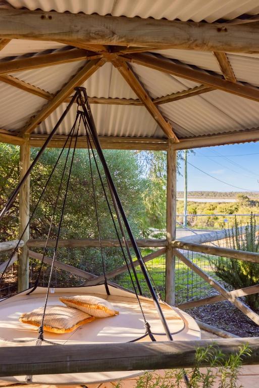 a hammock in a pergola with a view at Roo With A View By Swan Bnb Management in Preston Beach