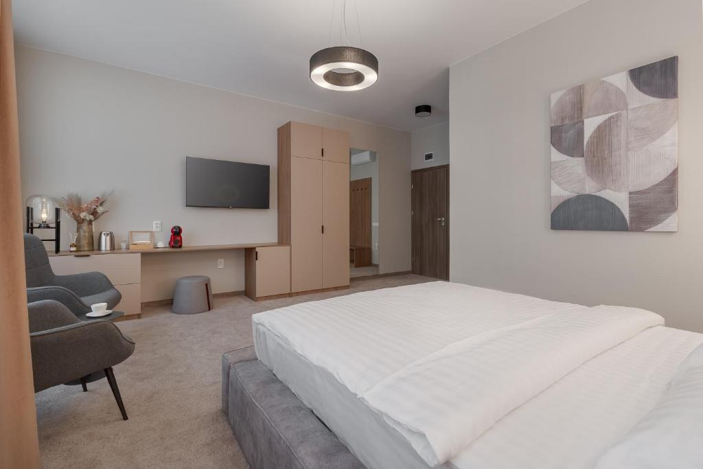 Postel nebo postele na pokoji v ubytování Oasis Rooms