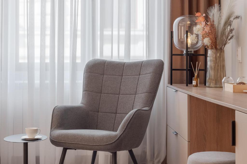 Posezení v ubytování Oasis Rooms
