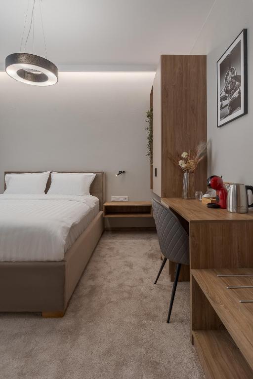 Postel nebo postele na pokoji v ubytování Oasis Rooms