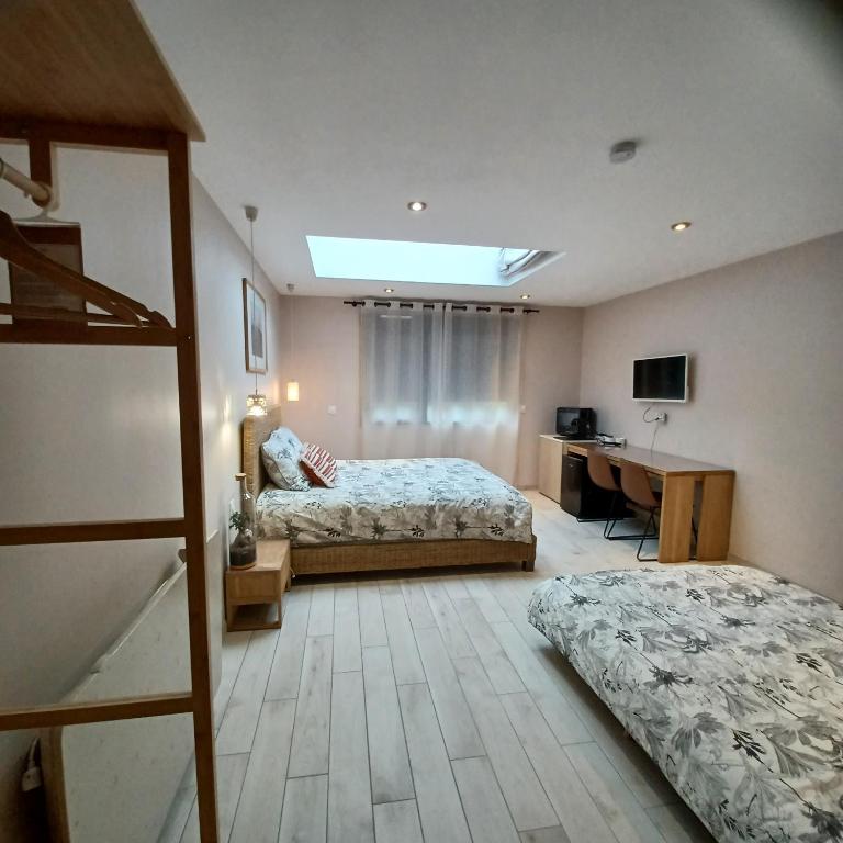 Postel nebo postele na pokoji v ubytování Serenity Indepedent Suite near to Disneyland & Paris