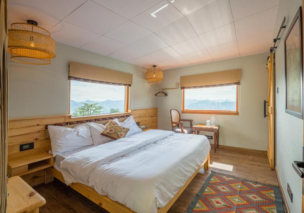 Letto o letti in una camera di Cedar Hill Lodge - A Boutique Homestay