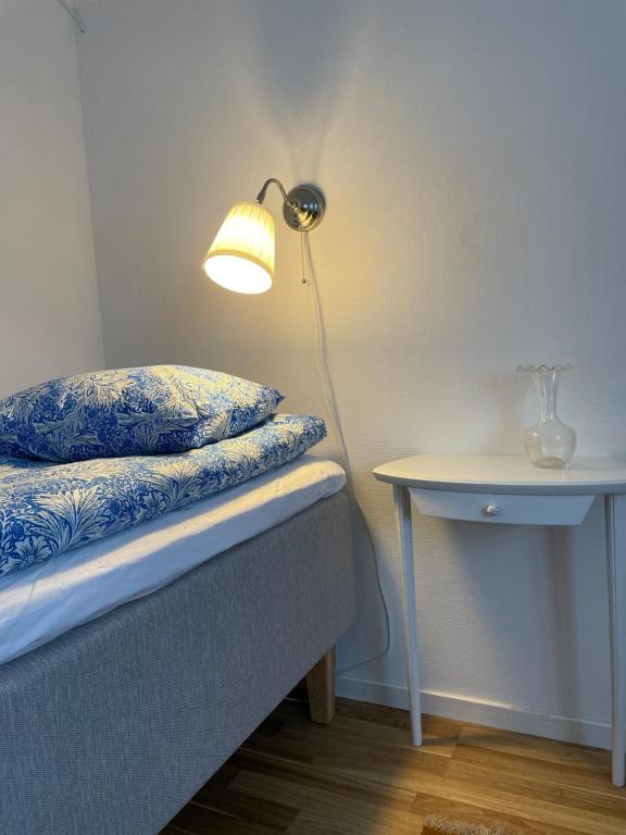 Postel nebo postele na pokoji v ubytování Gisebo Vingård