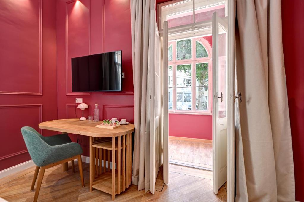 TV a/nebo společenská místnost v ubytování Hotel Uhland