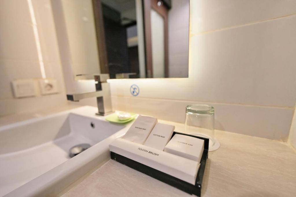 Koupelna v ubytování Bonnet Hotel Surabaya