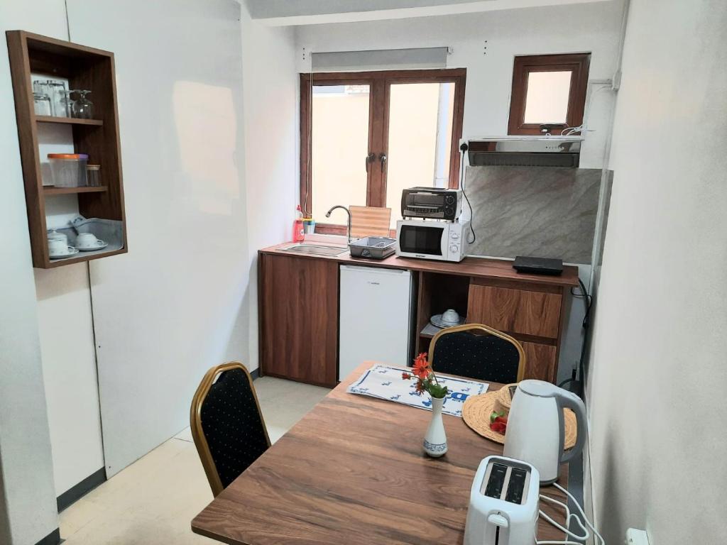 Kuchyň nebo kuchyňský kout v ubytování Citronella Villa Flic en Flac
