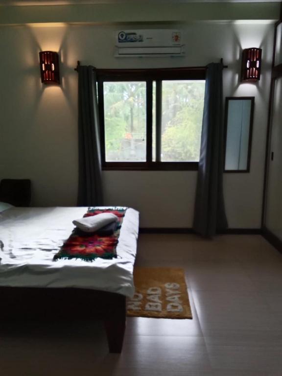 Postel nebo postele na pokoji v ubytování Private Beachfront Villa in Siargao