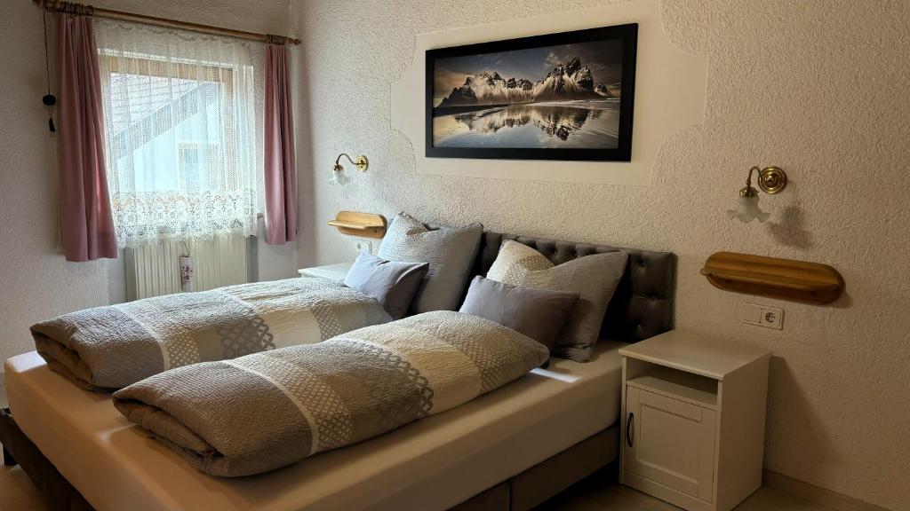 Postel nebo postele na pokoji v ubytování Residence Barbara