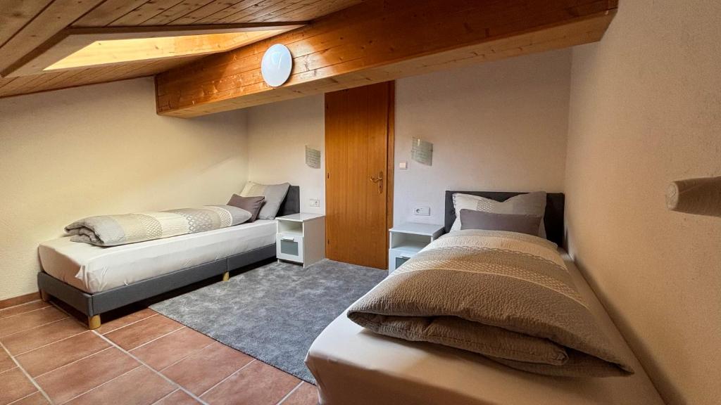 Postel nebo postele na pokoji v ubytování Residence Barbara