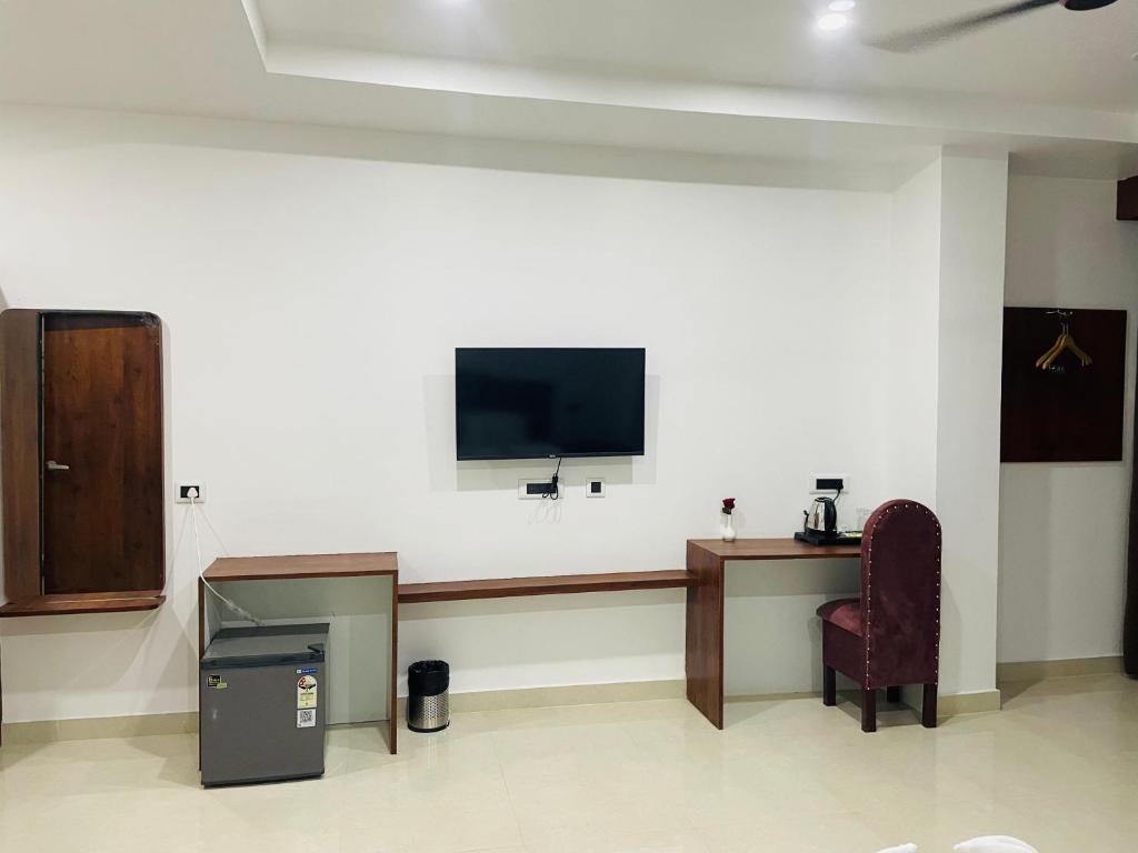 TV a/nebo společenská místnost v ubytování Hotel RKD Inn