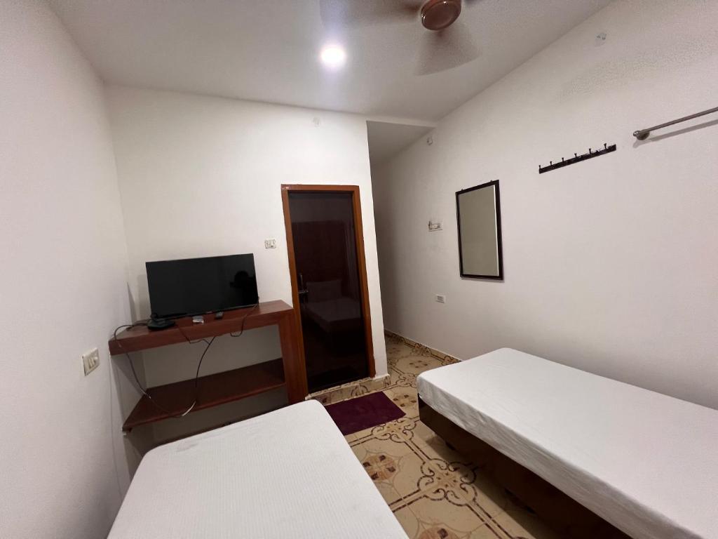 Postel nebo postele na pokoji v ubytování Hotel Safra