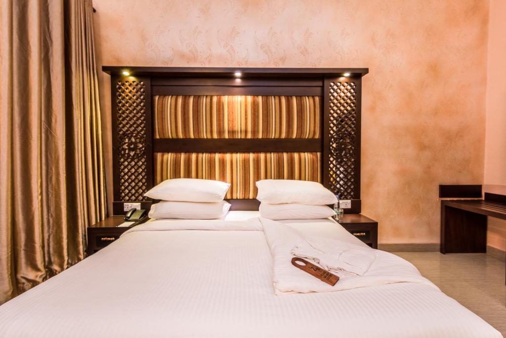 Postel nebo postele na pokoji v ubytování Mount Best Hotel- Mount Lavinia