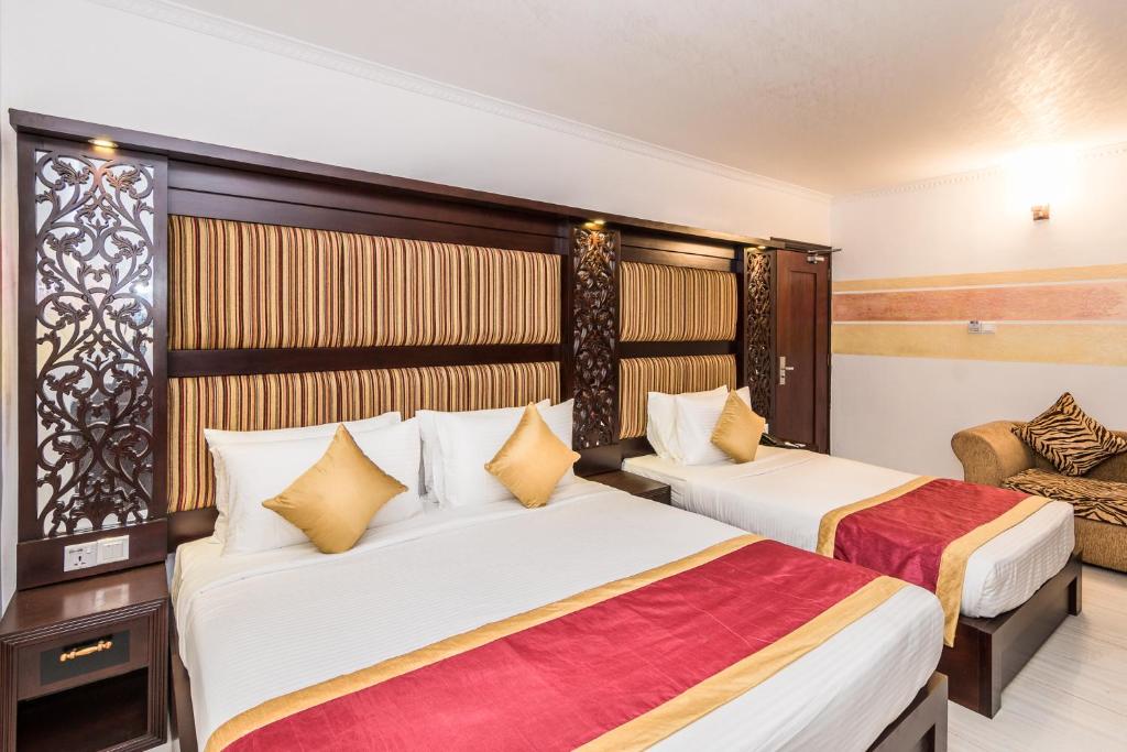 Postel nebo postele na pokoji v ubytování Mount Best Hotel- Mount Lavinia
