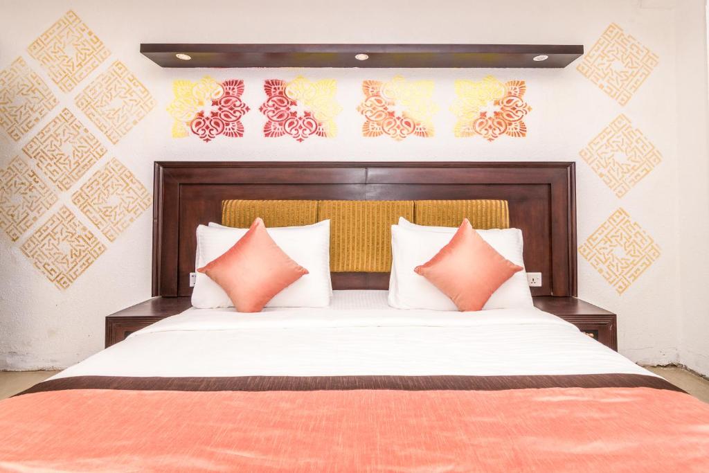 Postel nebo postele na pokoji v ubytování Mount Best Hotel- Mount Lavinia