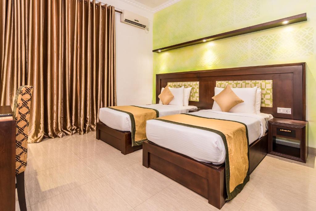 Postel nebo postele na pokoji v ubytování Mount Best Hotel- Mount Lavinia