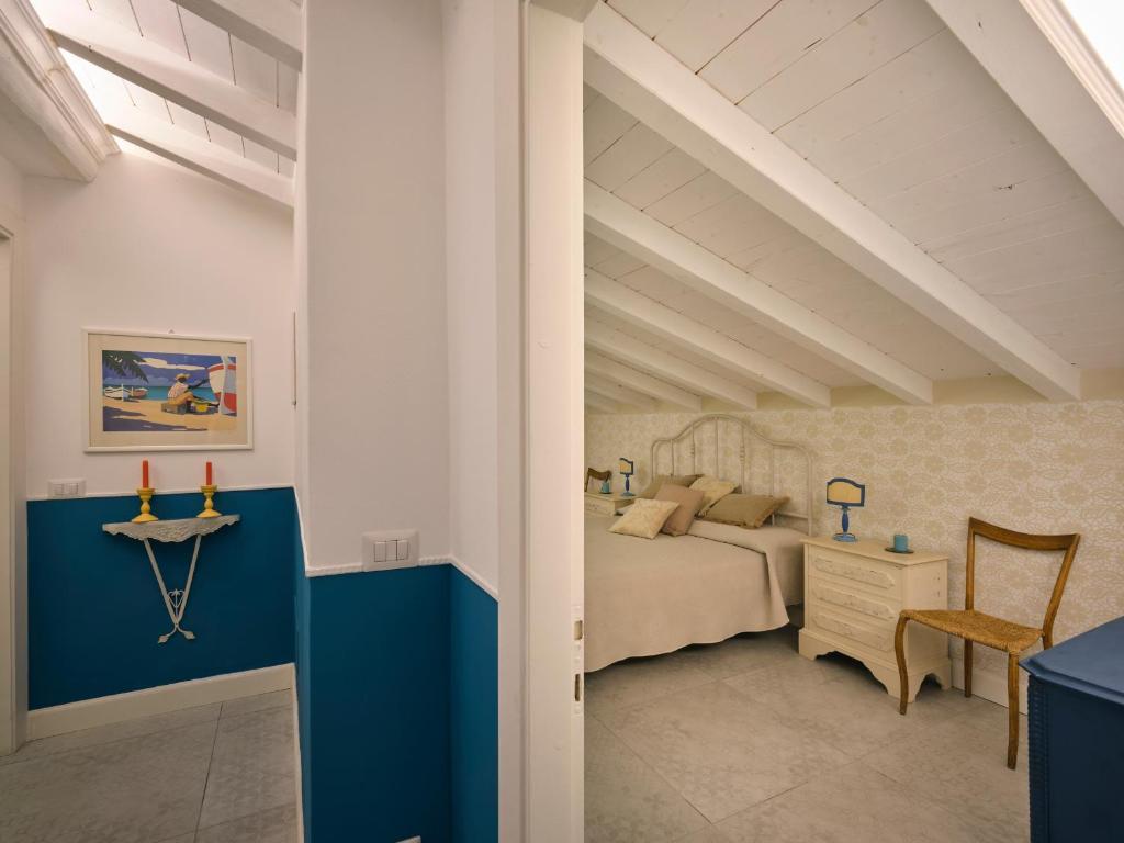 Postel nebo postele na pokoji v ubytování casa mileti