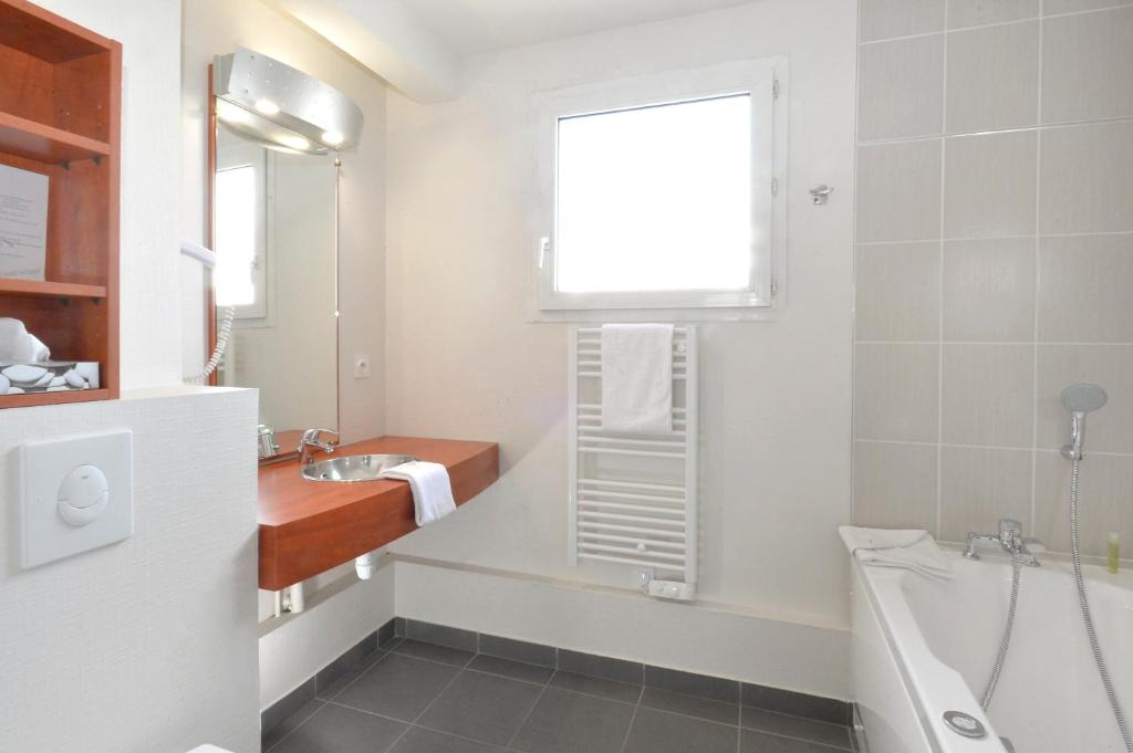 Koupelna v ubytování Brit Hotel Orléans St Jean de Braye - L'Antarès