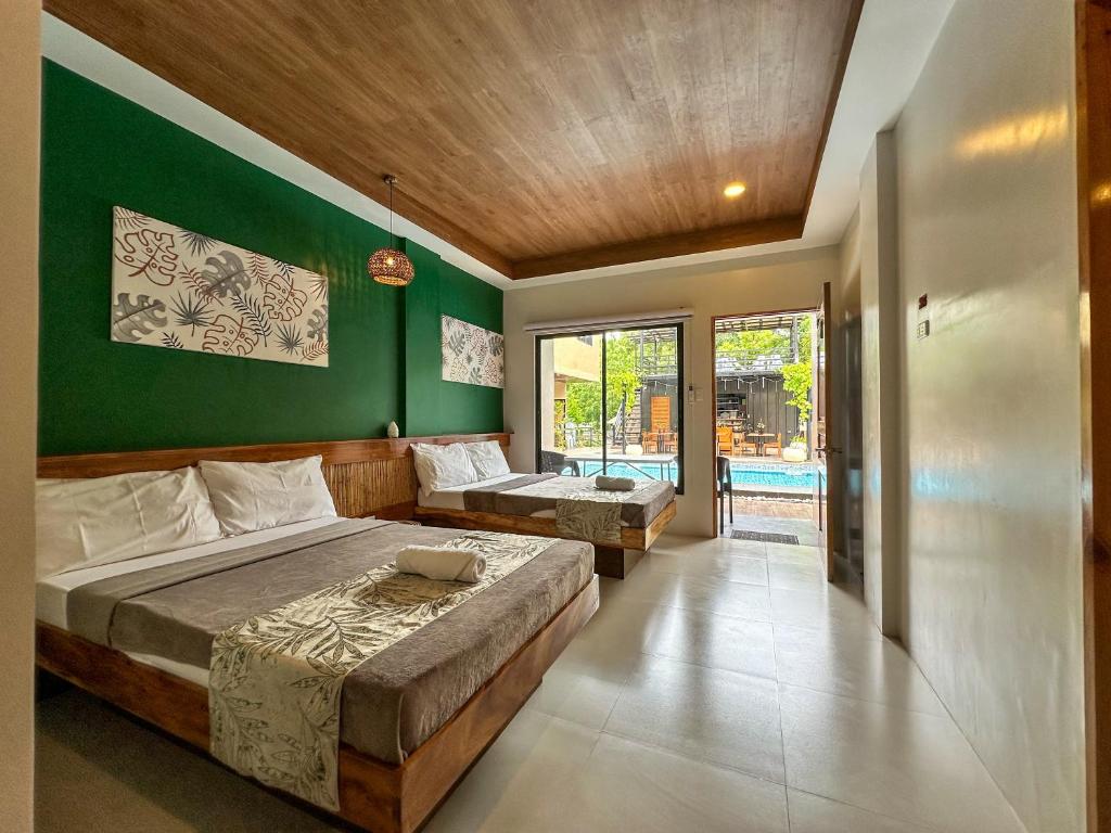 Postel nebo postele na pokoji v ubytování TEZA Resort