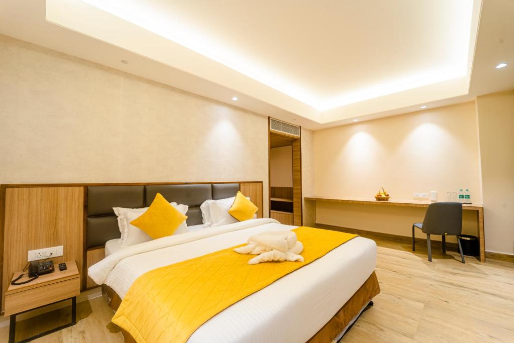 Postel nebo postele na pokoji v ubytování Hotel Palacio Regency