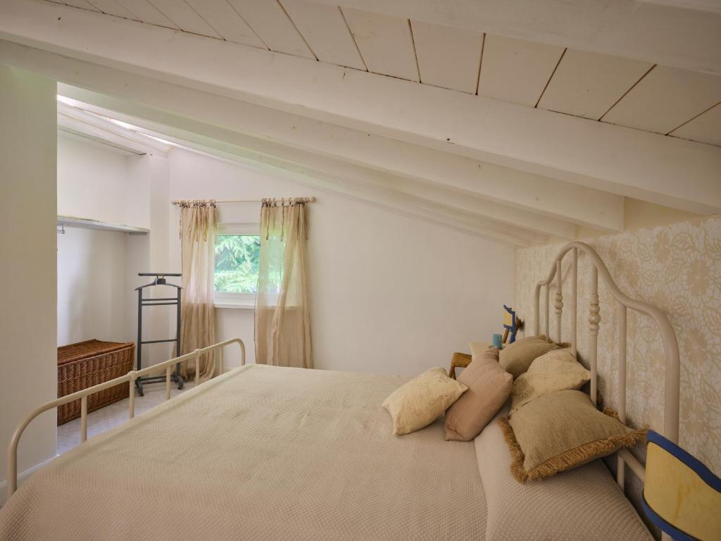 Postel nebo postele na pokoji v ubytování casa mileti