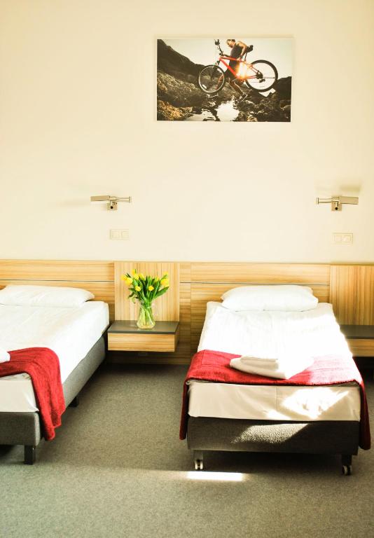 Postel nebo postele na pokoji v ubytování Aqua-Zdrój