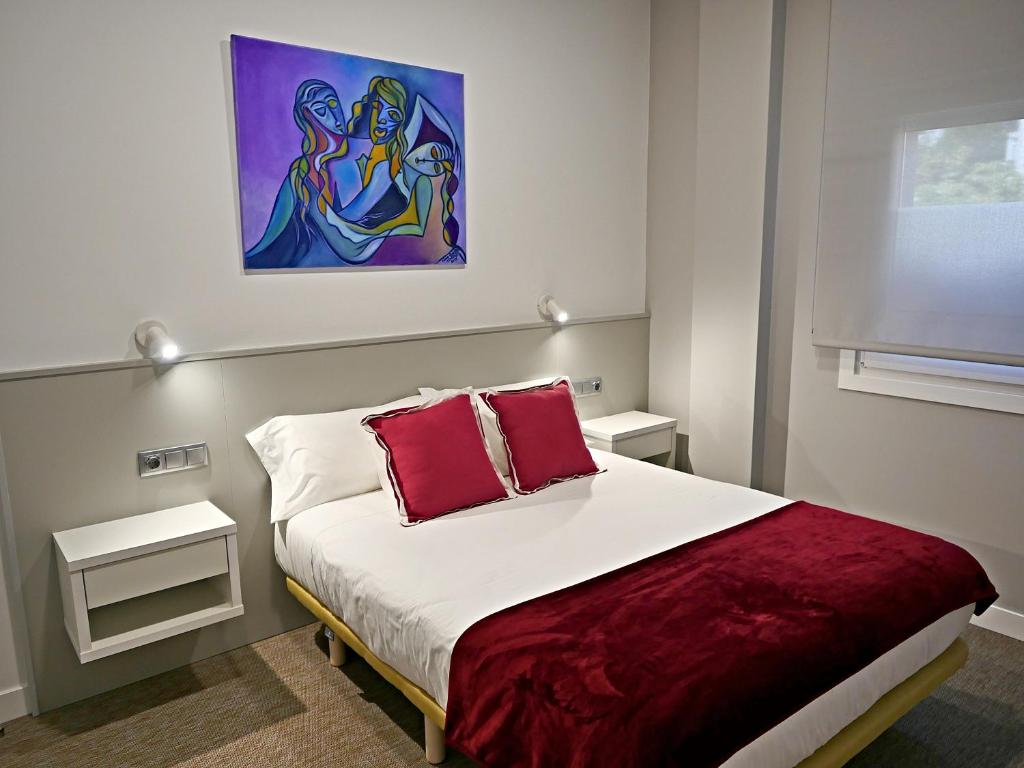 Postel nebo postele na pokoji v ubytování Siaba Pensión Boutique